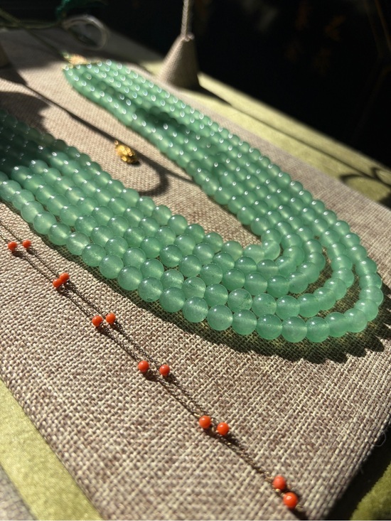 Jewelry - 5 strand (heated) Emerald bead necklace.